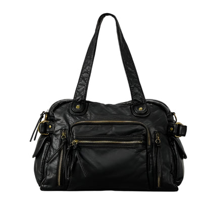 A person carrying a large black and brown retro style messenger bag.