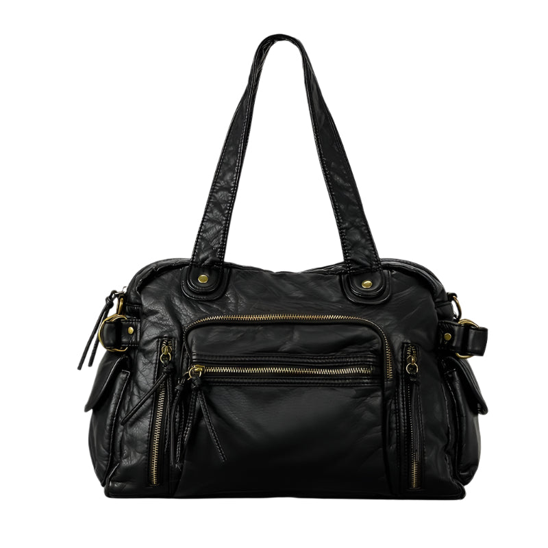 A person carrying a large black and brown retro style messenger bag.